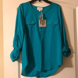 Turquoise girls dress shirt, size XL
